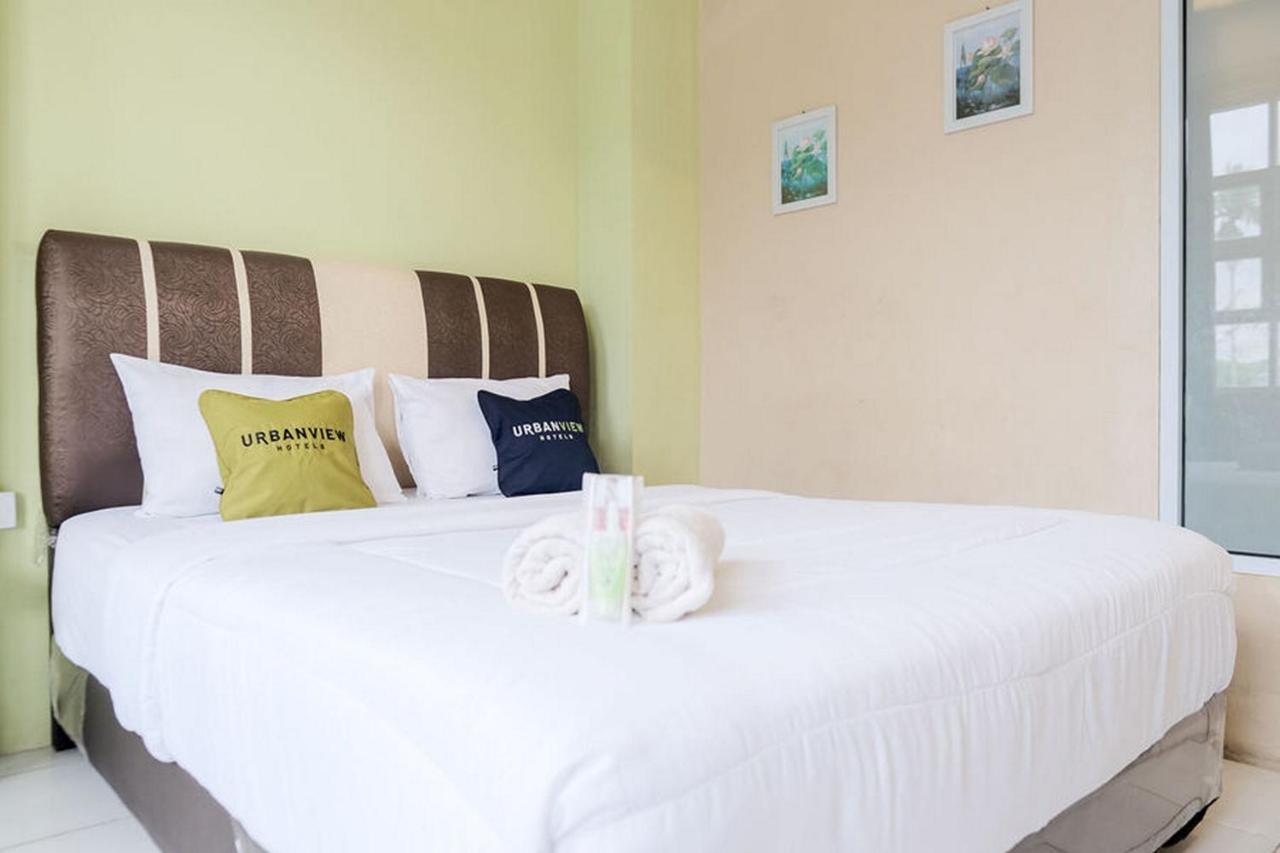 Urbanview Hotel Ta Ke Jelutung Puncak Jambi Luaran gambar