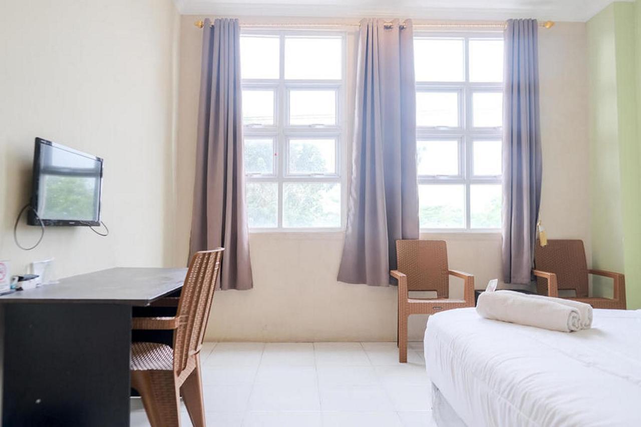Urbanview Hotel Ta Ke Jelutung Puncak Jambi Luaran gambar